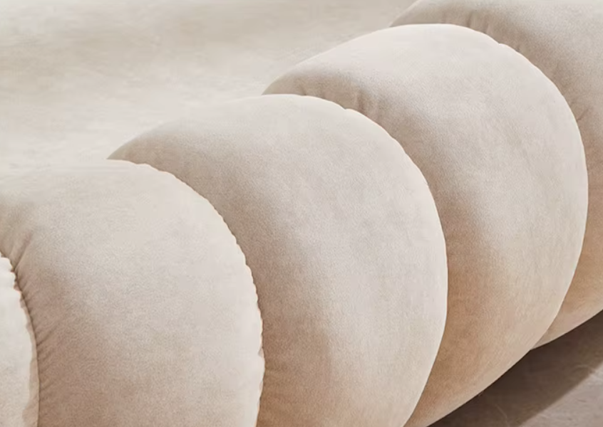 Nordic Home Fauteuil – elegante pompoenvormige stoel die zowel stijl als comfort biedt, perfect voor ontspannen zitplekken in diverse interieurs.