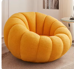 Home Fauteuil in geel – een levendige en stijlvolle stoel met een Nordic pompoenvorm, ideaal voor een gezellige en vrolijke toevoeging aan je ruimte.