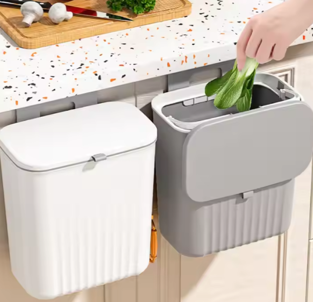 Compacte afvalemmer van 9L voor moderne keukens, verkrijgbaar in diverse kleuren.