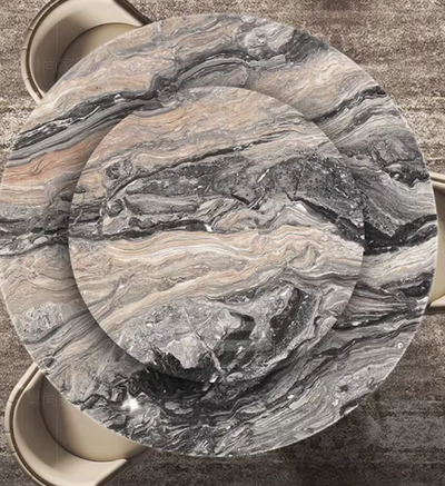 Ronde eettafel met zwart-grijs marmeren blad en draaibaar plateau, luxe design met natuurlijke aders.