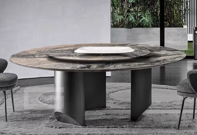 Ronde marmeren eettafel met metalen pootconstructie, modern design voor binnen of buiten.