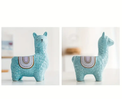 two ceramic llama plant pots