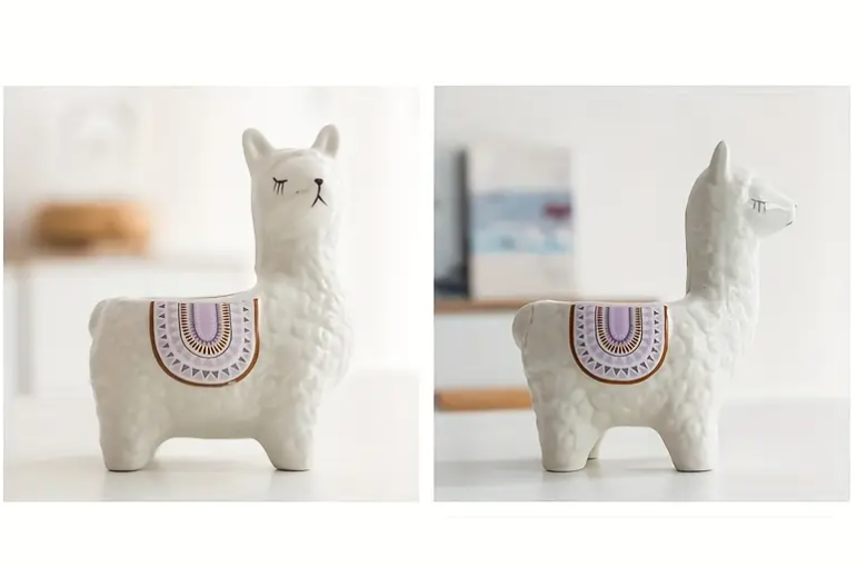 two ceramic llama plant pots